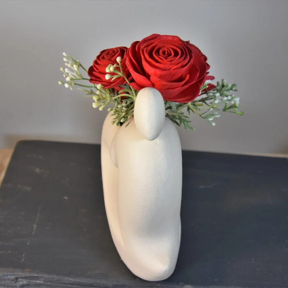 Sexy white curvy hearts vase with 4 red Sola wood roses that will last forever!